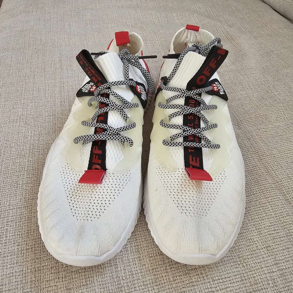 White Sneakers with Red and Black Accents